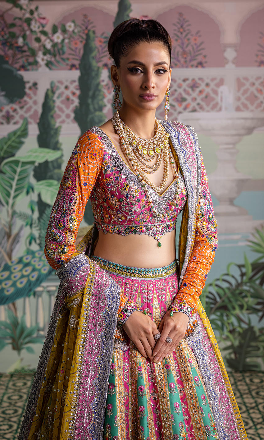 Traditional lehenga choli in pink, purple, yellow, and blue for weddings