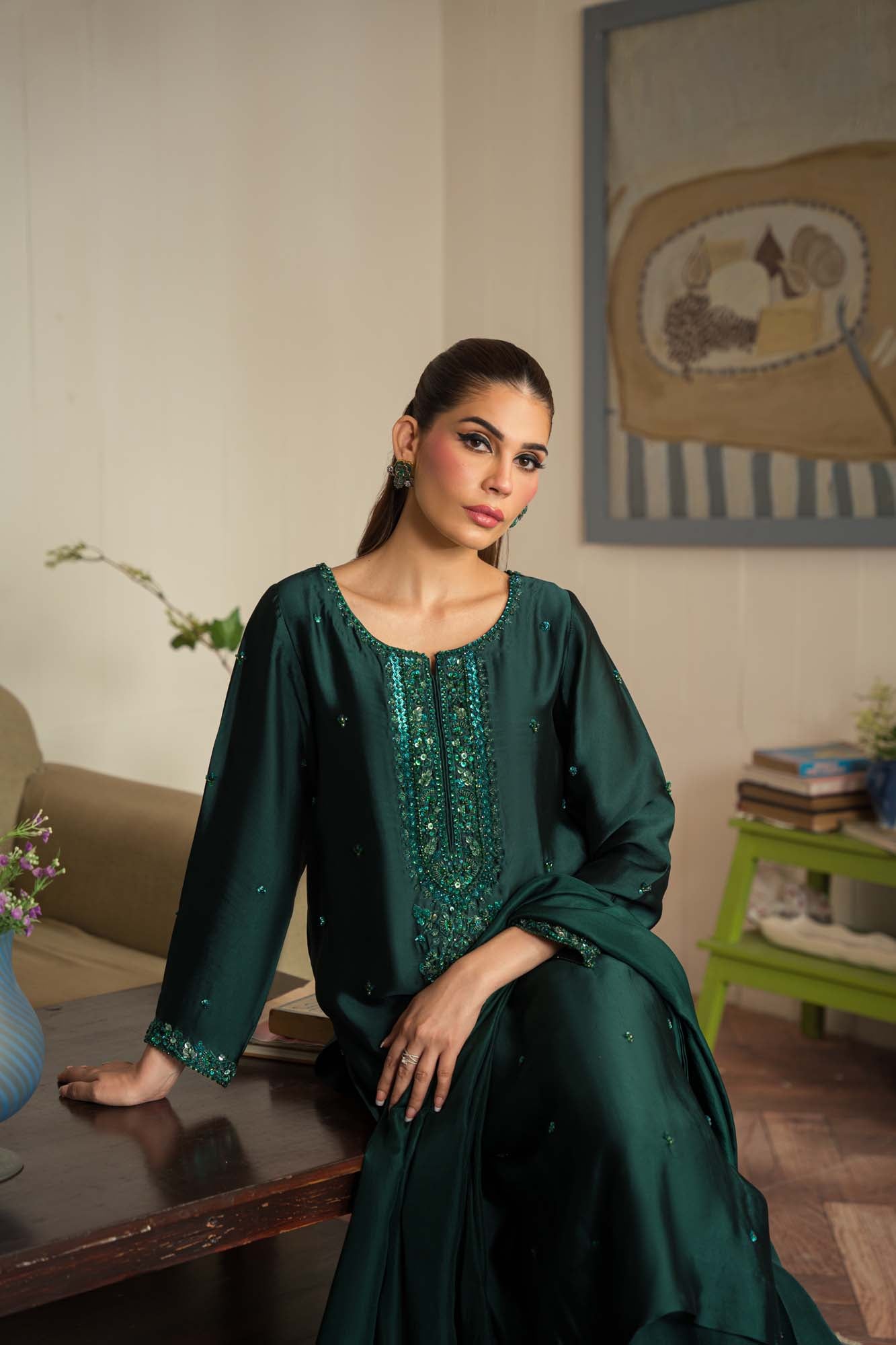 model wearing Elegant Sheesha Silk Shalwar Kameez with Embellished Hemline