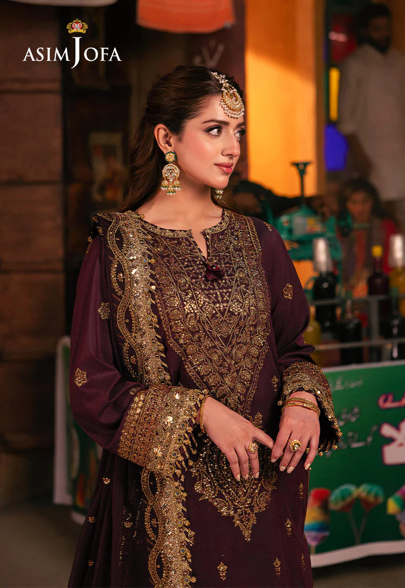 Purple twisted silk suit with embroidered chiffon dupatta