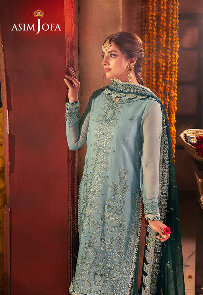 Luxury Asim Jofa green chiffon ensemble with sunbeam-inspired embroidery