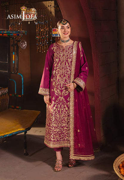 Vibrant purple twisted silk suit with desert-inspired gold embroidery and sequins