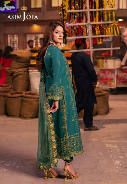 Elegant embroidered green suit with matching silk trousers