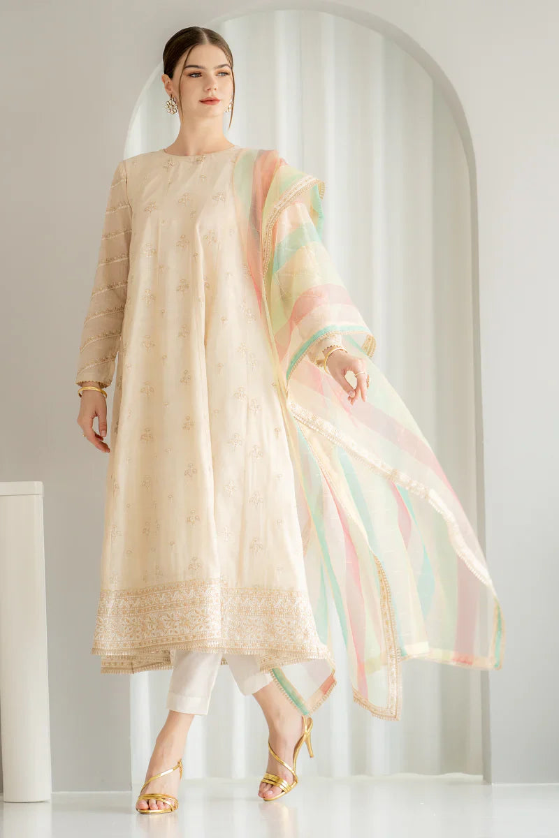 USA-based store Pakistani outfit in cream with sequins