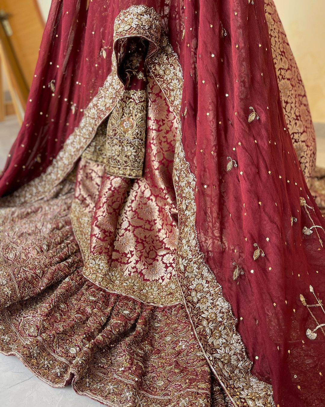 Detailed hand embroidery on Pakistani Indian bridal lehenga set lehnga