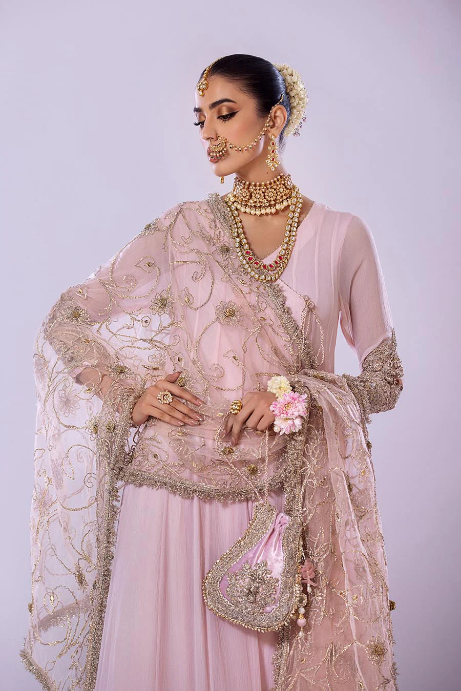 Net dupatta with Gotta detailing draped over model