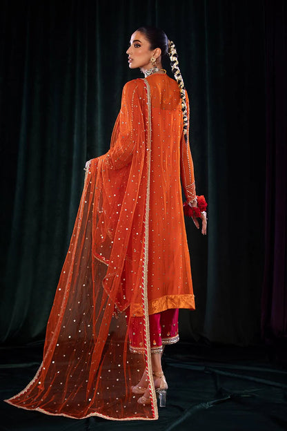 Model holding Net dupatta with Gotta and lace accents