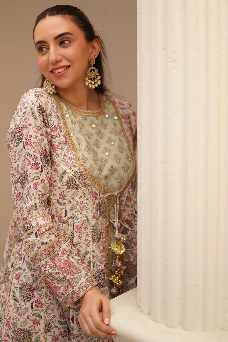 Traditional green viscose kurta with hand embroidery and print, paired with pants and dupatta