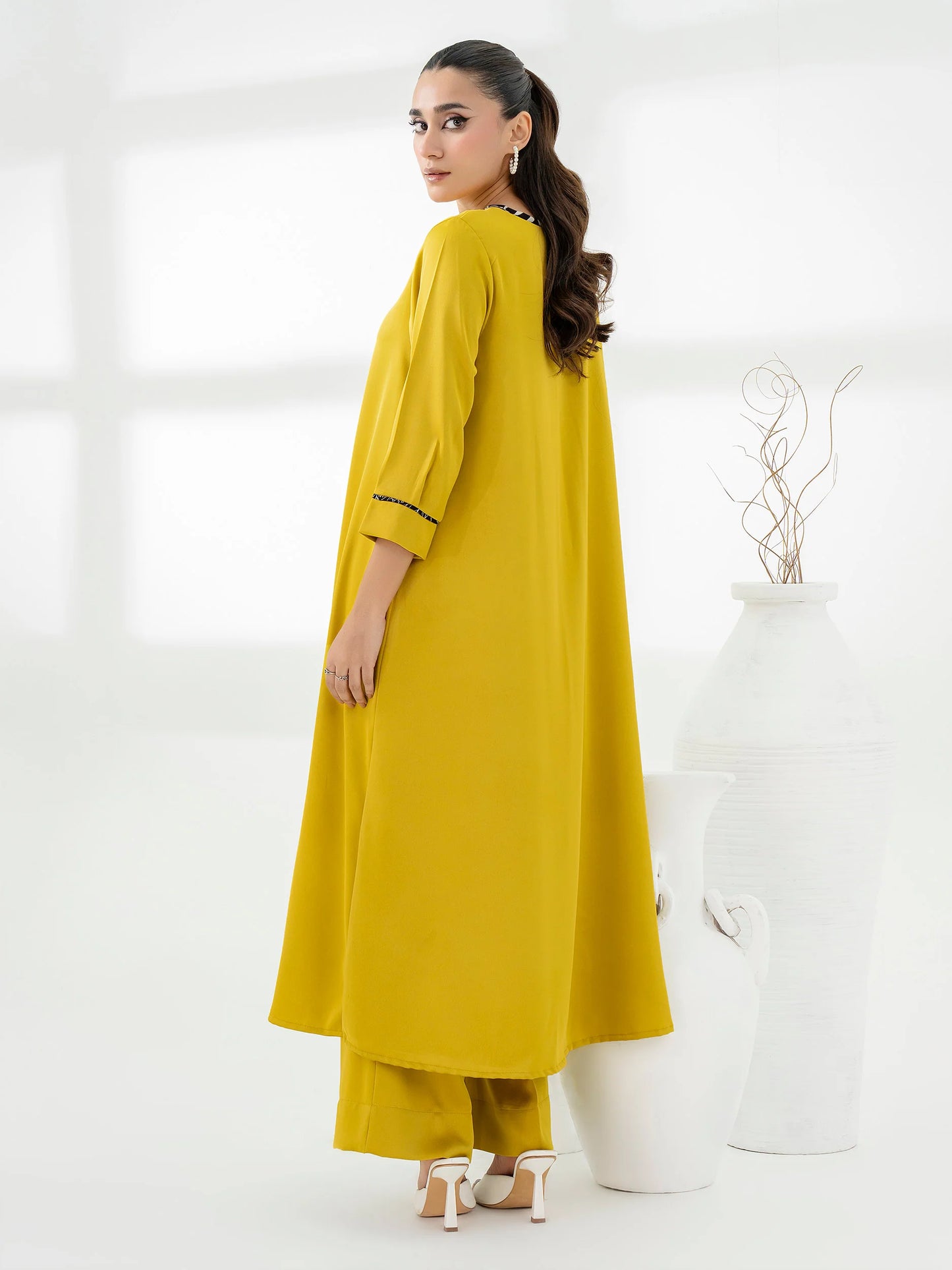 Yellow Silk suit with printed slit shirt and elasticized waistband trousers