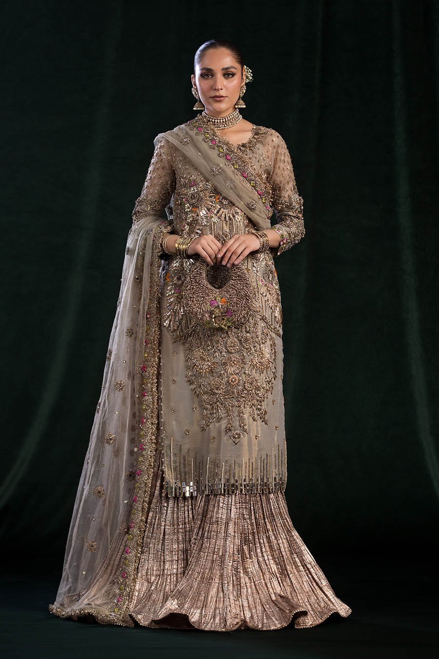 Full outfit showcasing embroidered net dupatta and crushed silk sharara